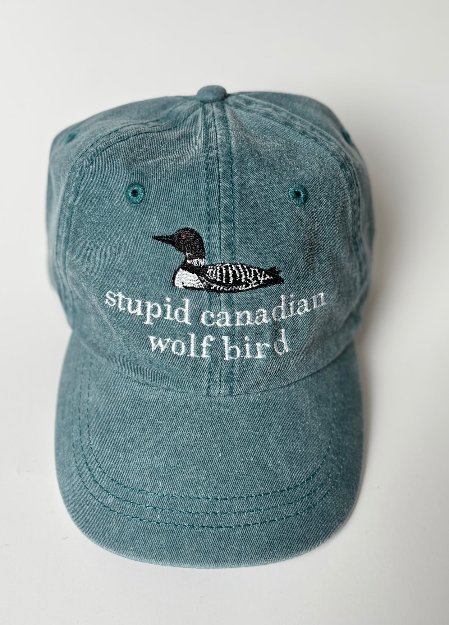 Stupid Canadian Wolf Bird Baseball Cap